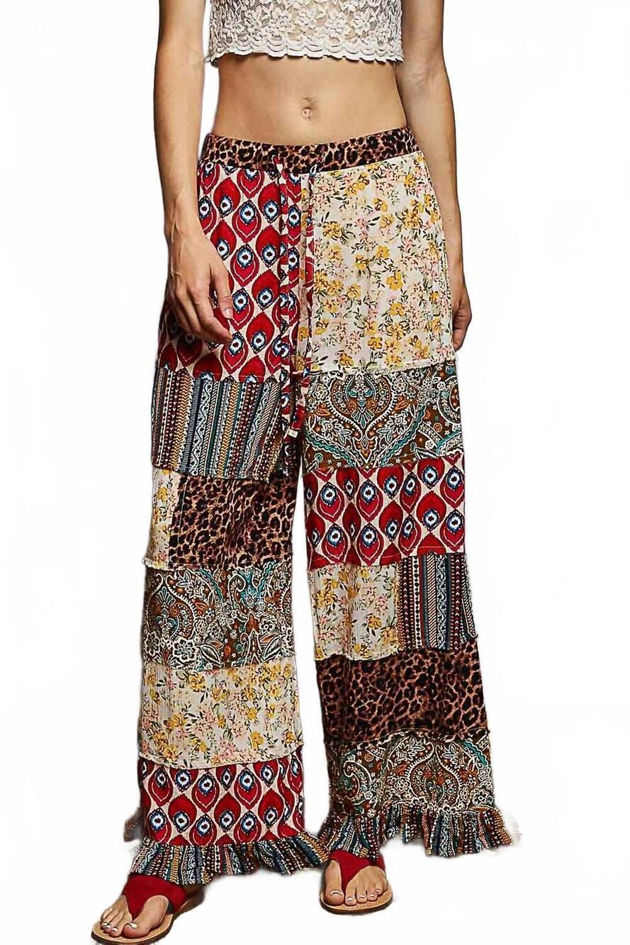 NEW POL floral flare pants in red multi